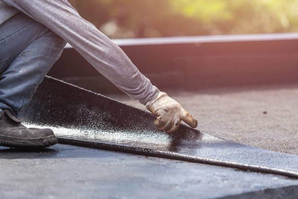 Professional Emergency Waterproofing technician working in Kent City, MI